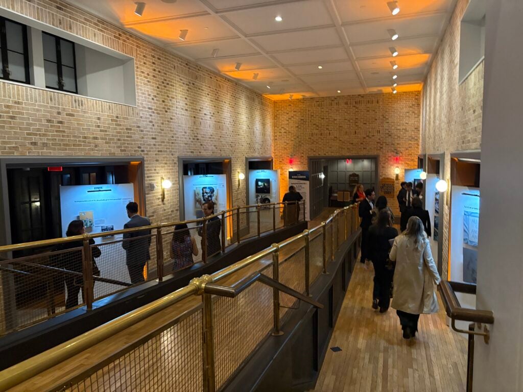 People view posters in gallery at the LINE DC