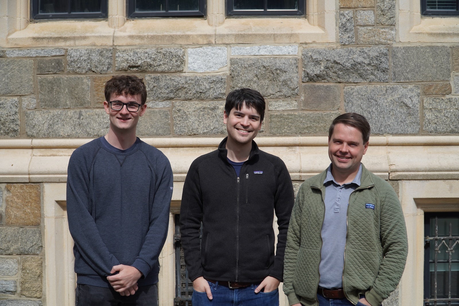 Uhlik, Gamino-Cheong, and Wacek post in front of White-Gravenor