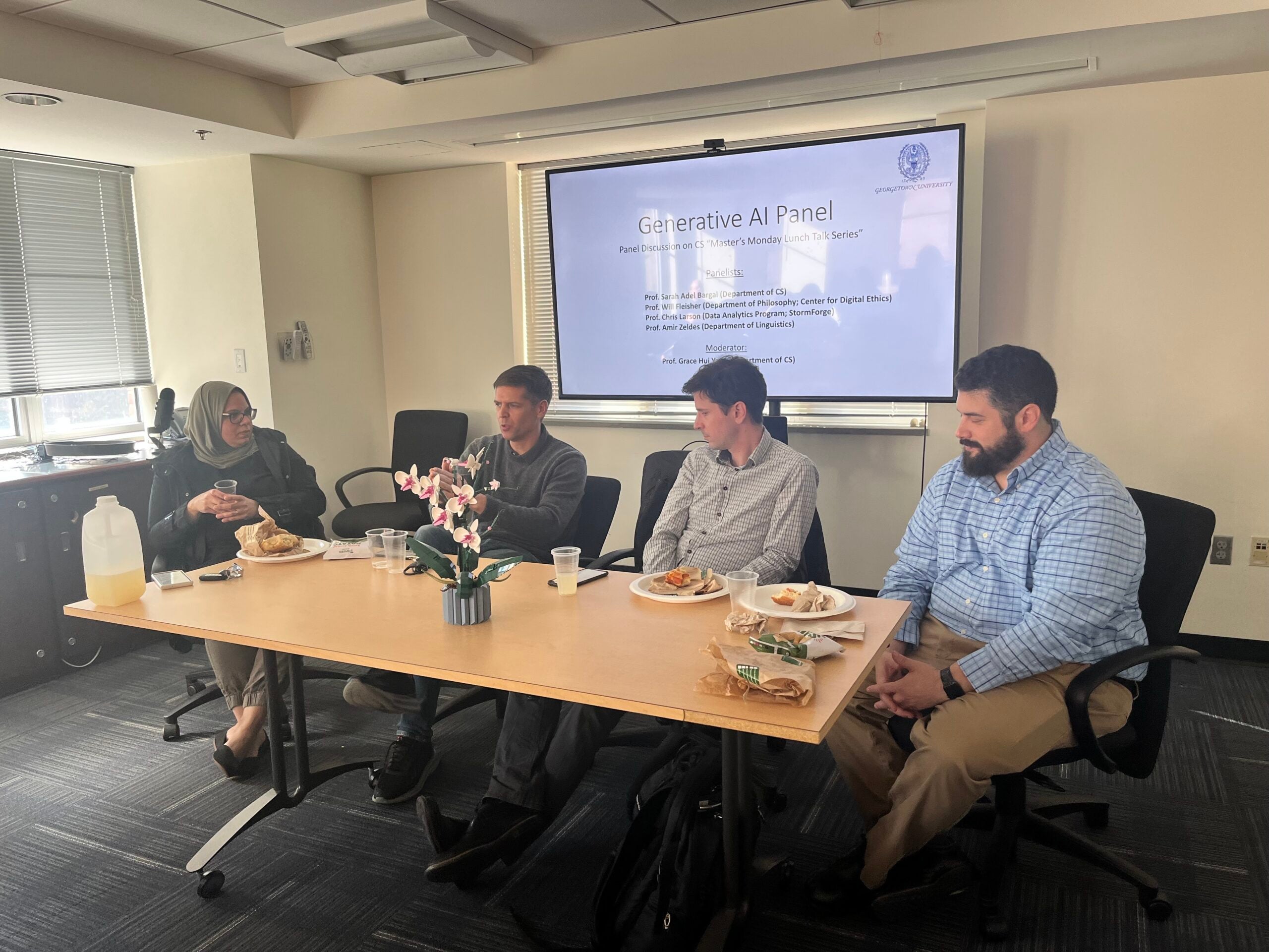 The panelists were Prof. Sarah Adel Bargal (Department of Computer Science; Computer Vision & Machine Learning), Prof. Will Fleisher (Department of Philosophy, Center for Digital Ethics; Digital Ethics), Prof. Chris Larson (Data Analytics Program, StormForge; Robotics & Machine Learning), and Prof. Amir Zeldes (Department of Linguistics; Computational Linguistics). The panel discussion was moderated by Prof. Grace Hui Yang.