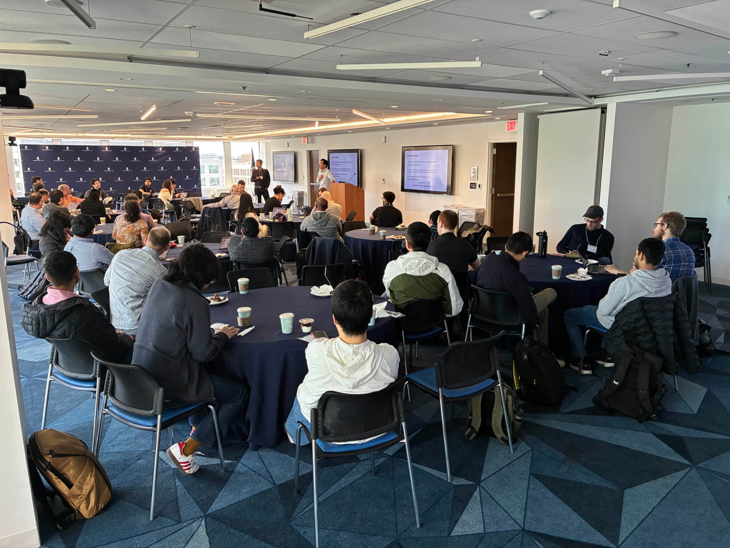 large room with workshop participants
