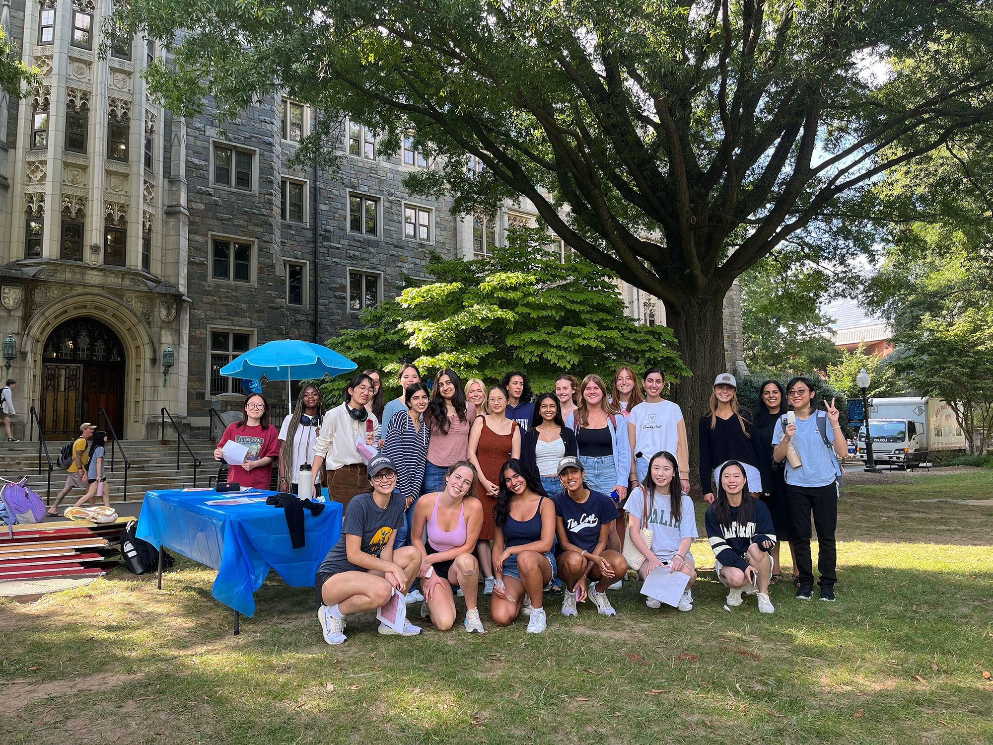 student group on the lawn