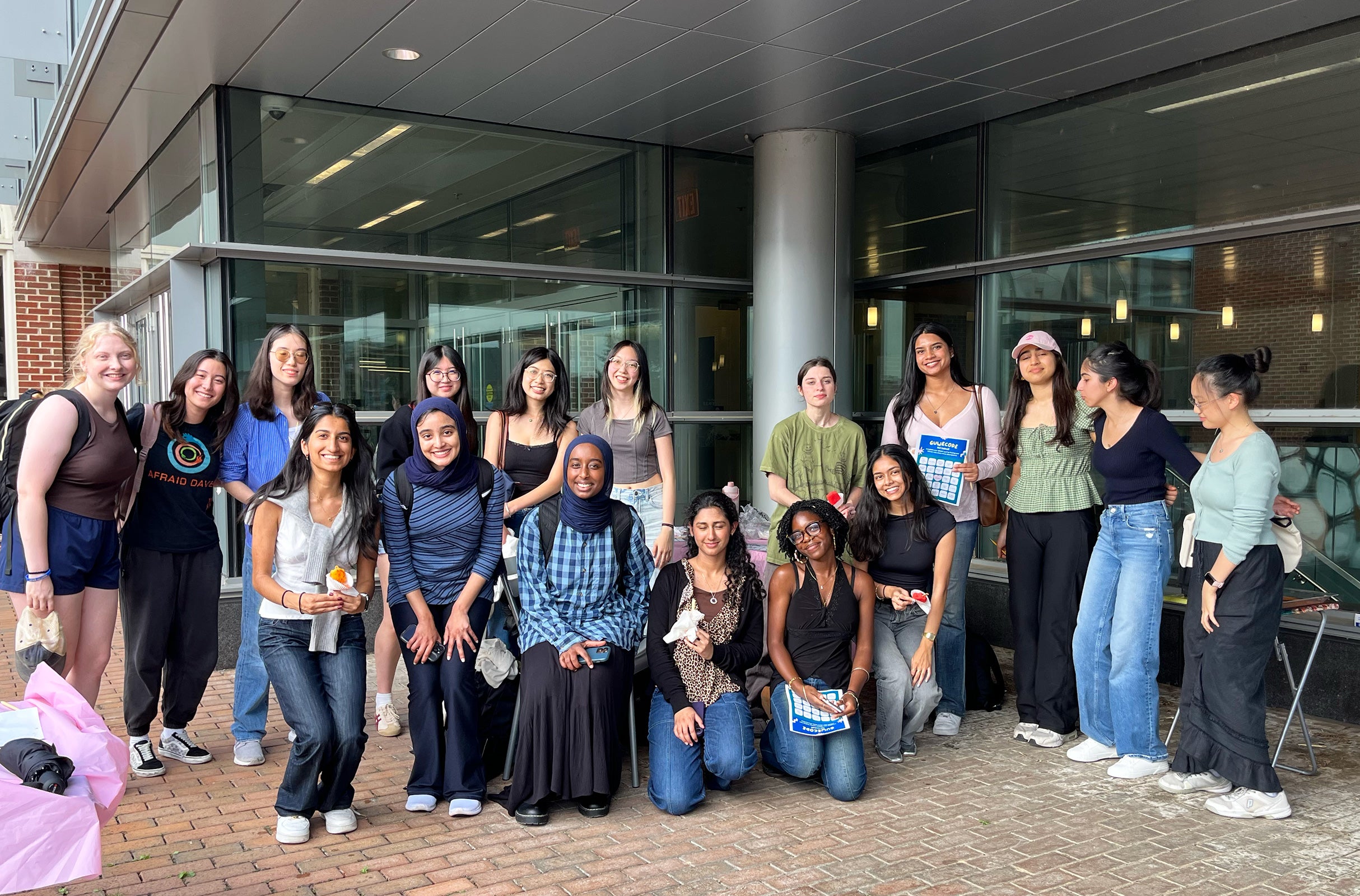 group of students in front of a building